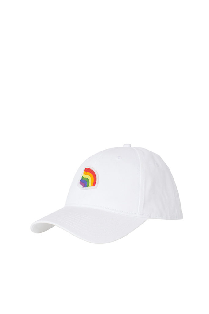 A white cap with pride slogan is part of H&M Unveils Love For All Collection