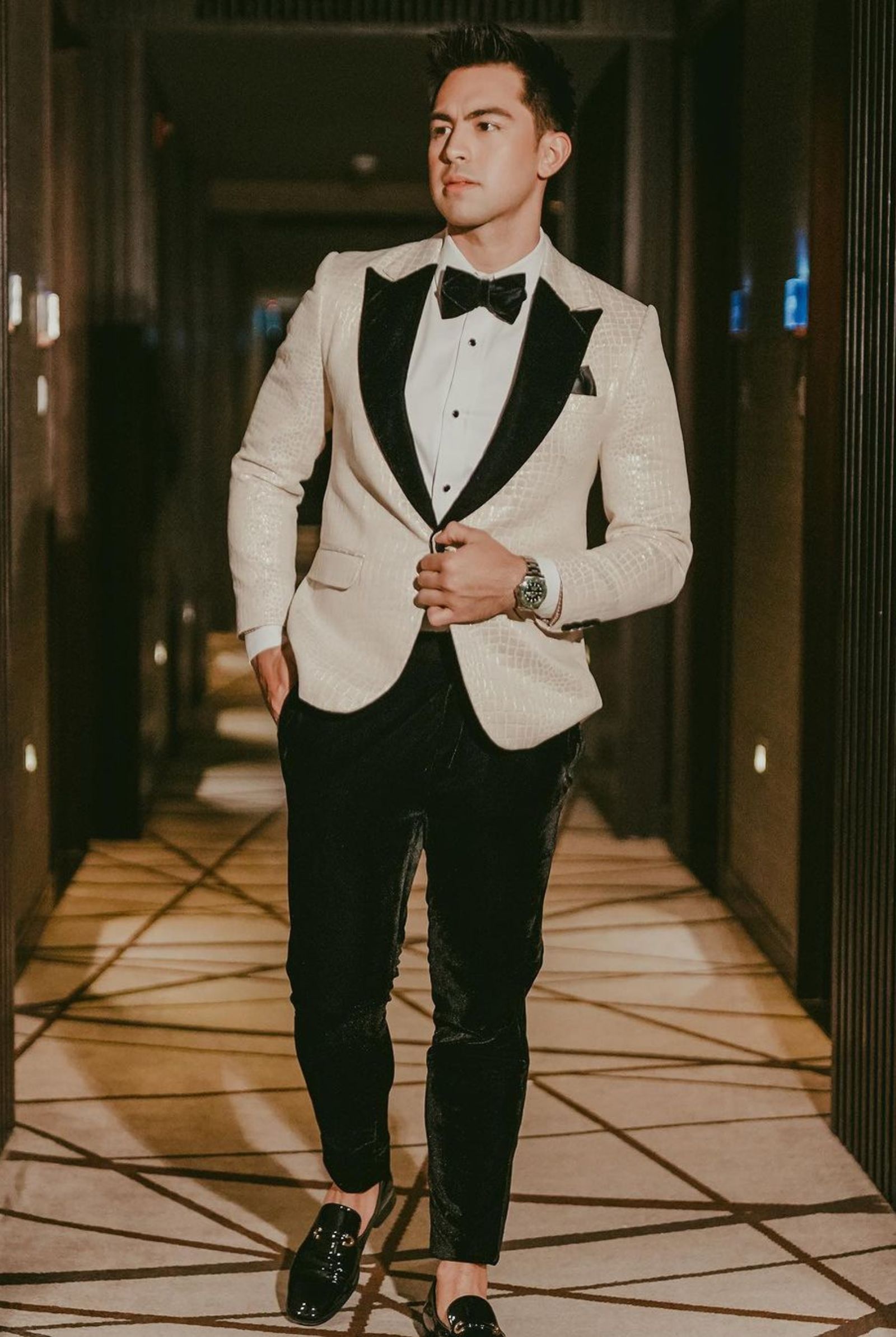 Derrick Monasterio wears a custom suit from Ryan Chris