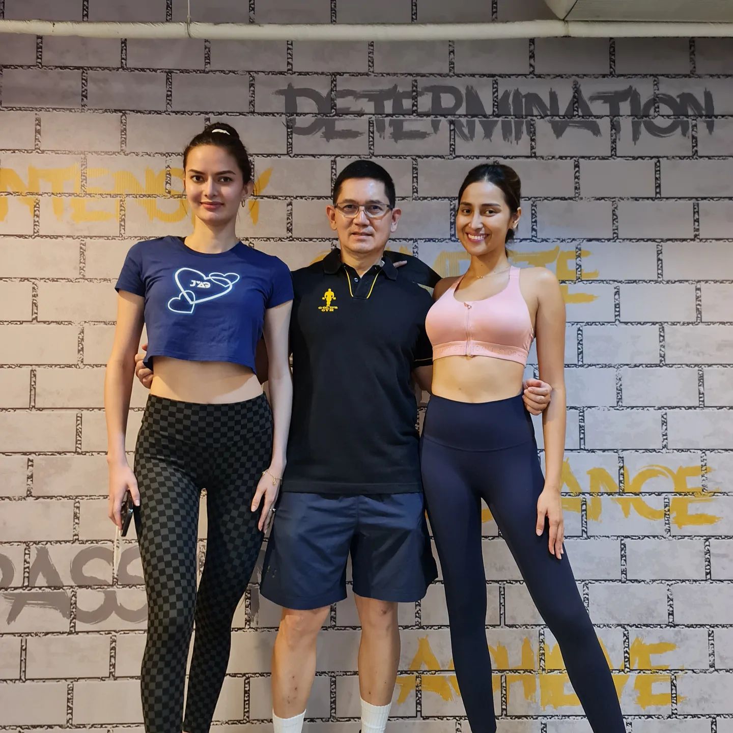 Beauty queen trainer Angelo Mendez with Binibining Pilipinas Intercontinental 2022 Gabrielle Camille Basiano and Miss CosmoWorld 2022 Meiji Cruz