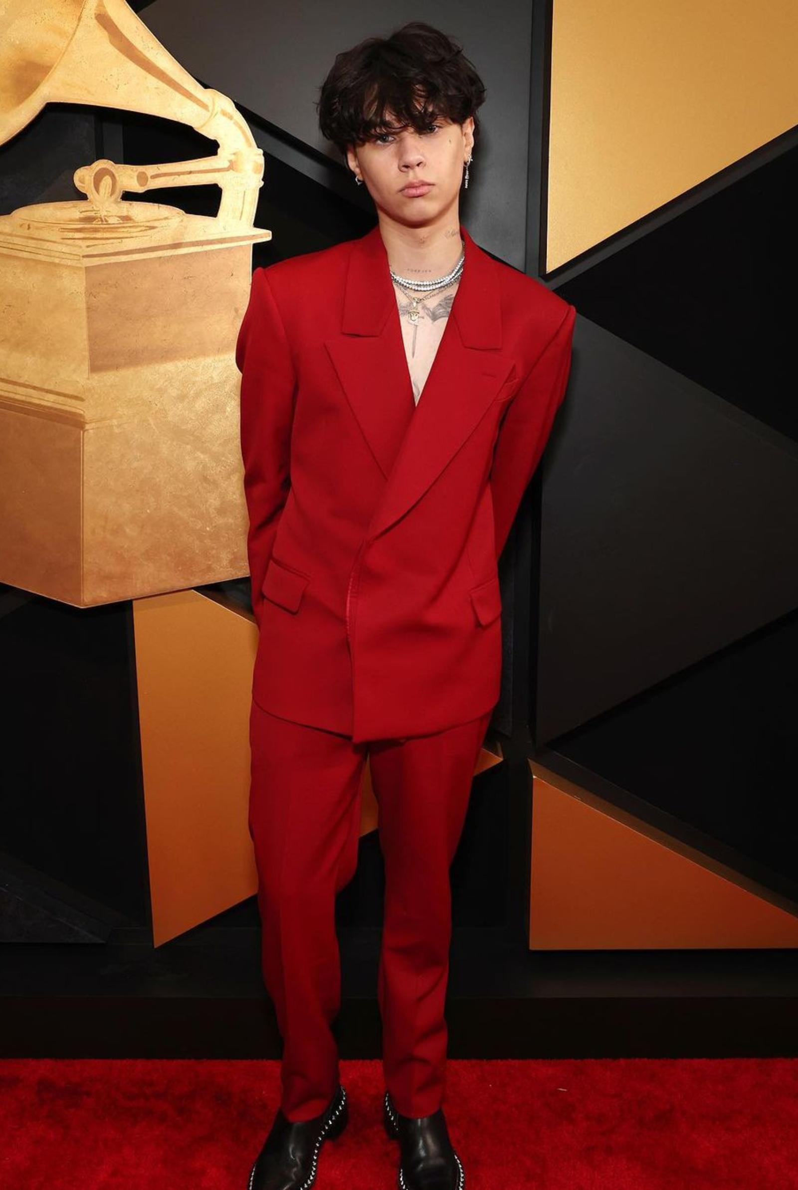 Commanding attention with ease, Landon Barker shines in a red number