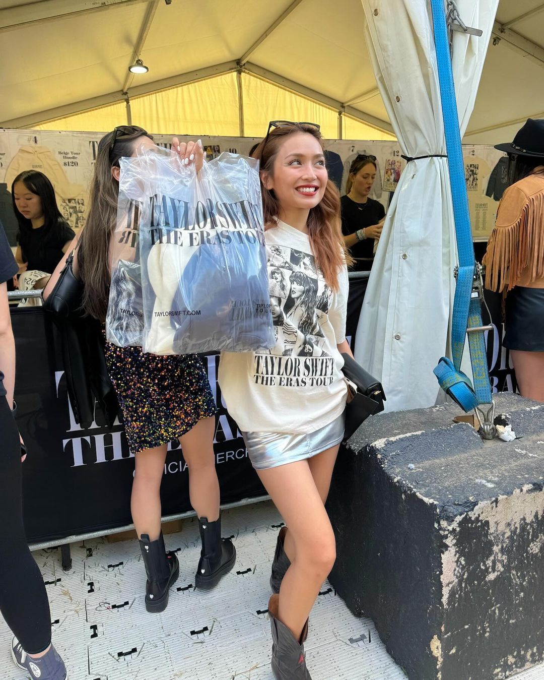 Kathryn with Taylor Swift merchandise