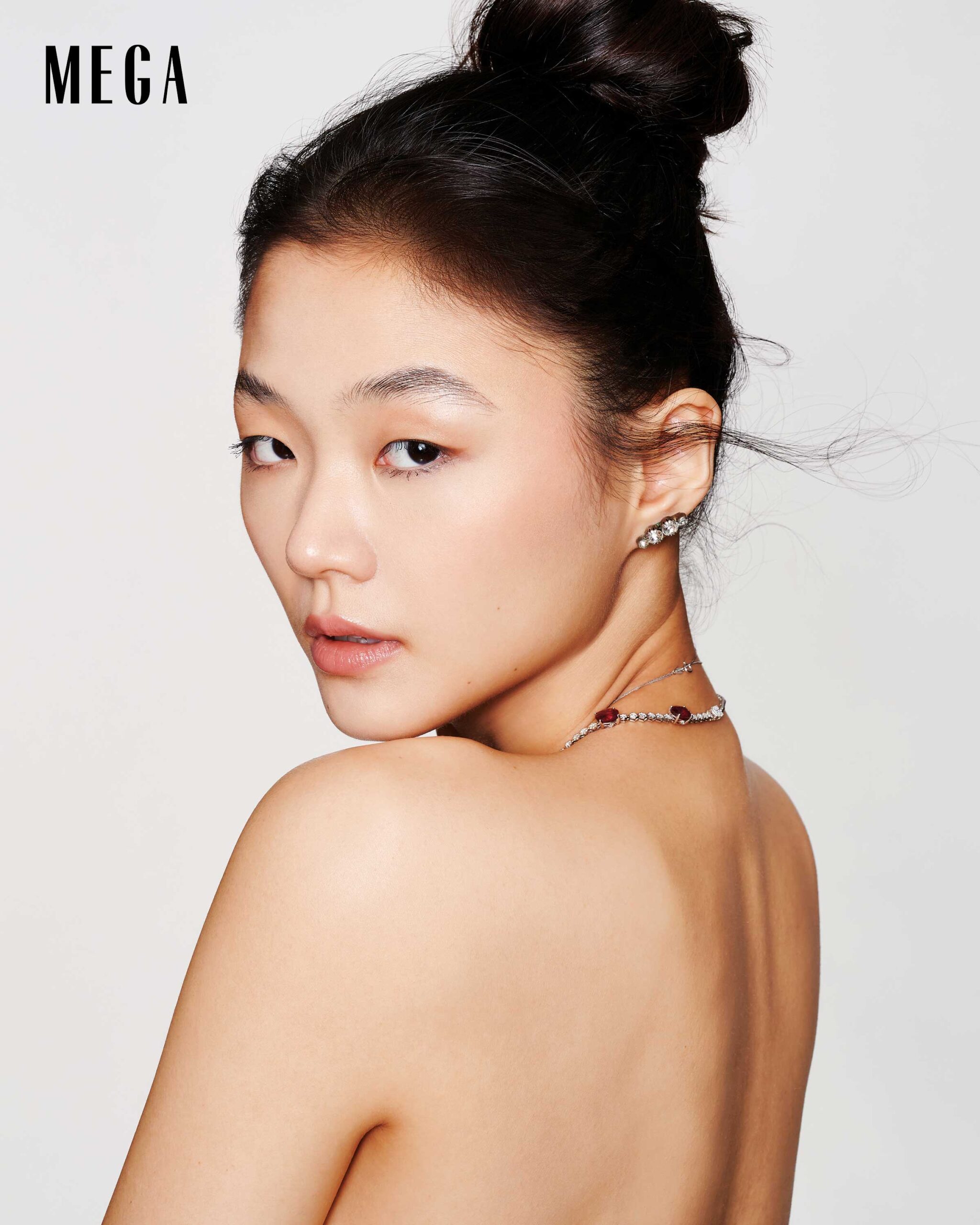 Selina Woo Bhang is wearing a necklace by LVNA BY DRAKE DUSTIN