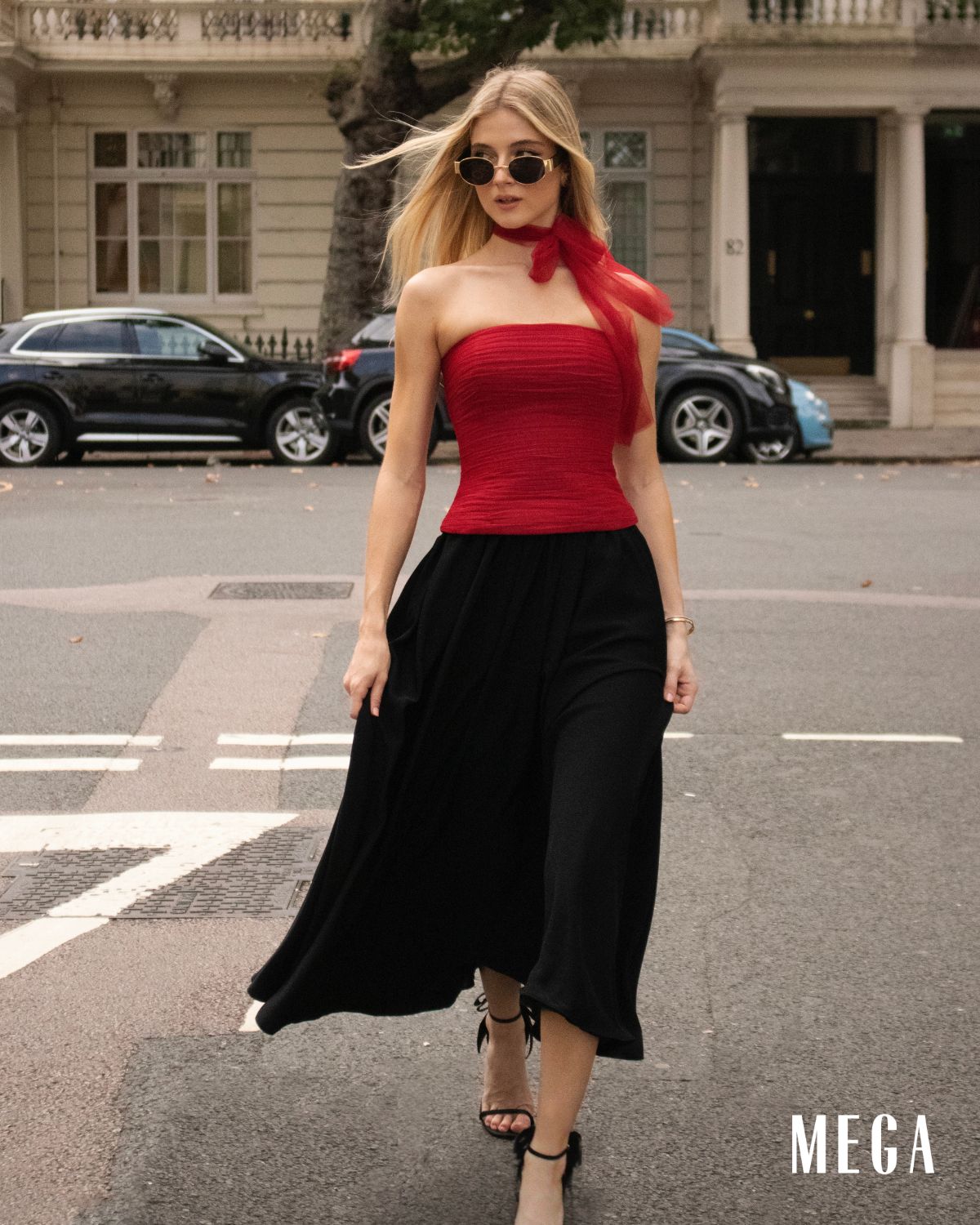 glasses red top black skirt carlene zervoulakos london atelier