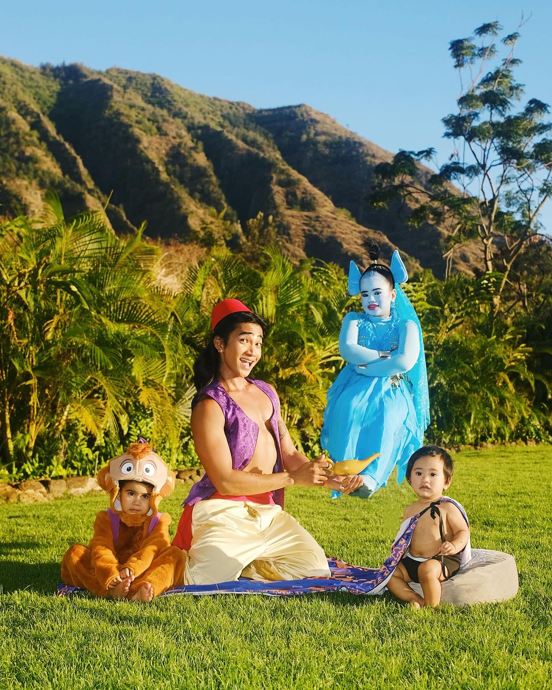 Bretman Rock with his nieces and nephew Cleo, Ezekiel, and Nu'oTofi as the characters from Aladdin.