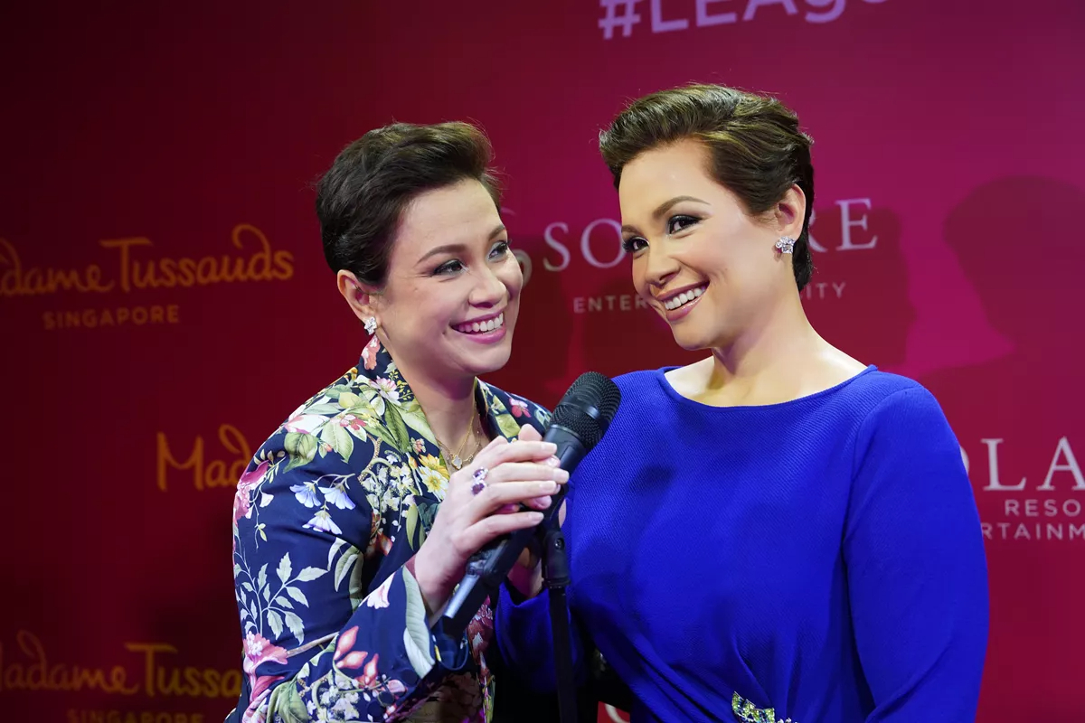 Broadway star, singer, and actress Lea Salonga with her wax figure in Madame Tussauds Singapore