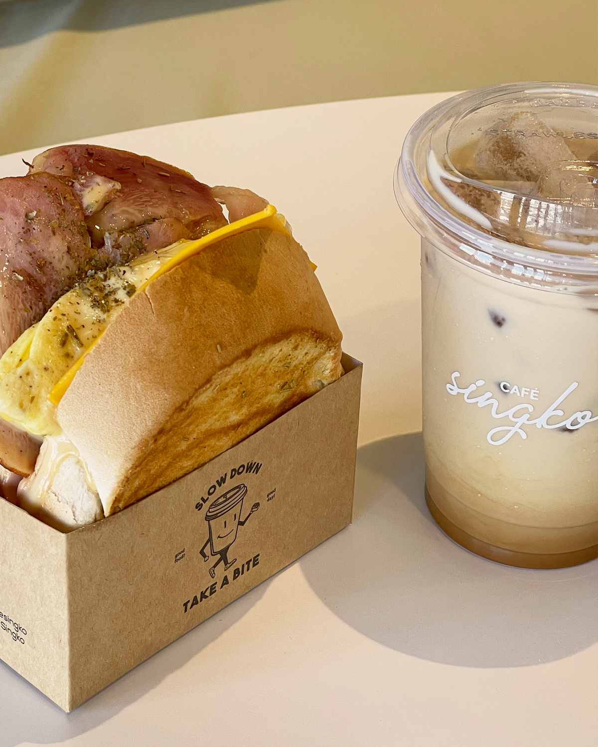 Their best-selling Egg Drop Sandwich paired with your favorite coffee Cafe Singko breakfast lunch cafe coffee shop drinks food friends family partner alone