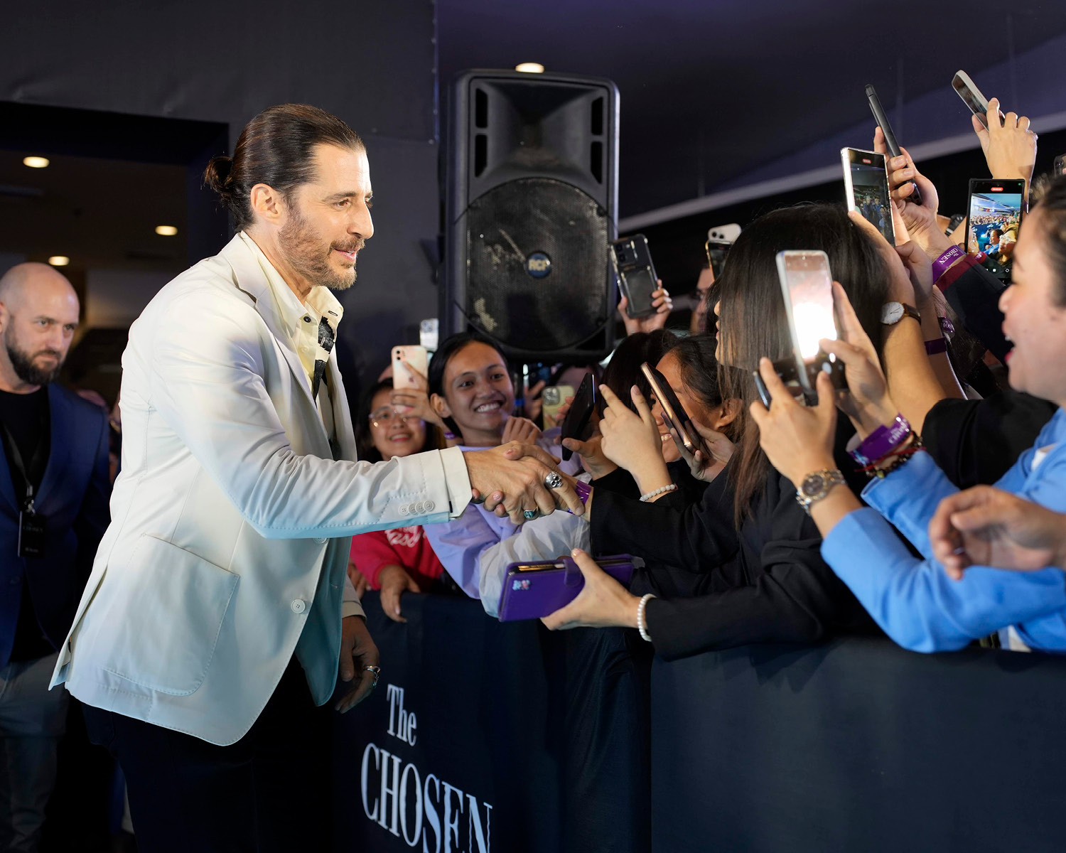 Actor Jonathan Roumie greeting fans during the fan screening of Christmas With The Chosen